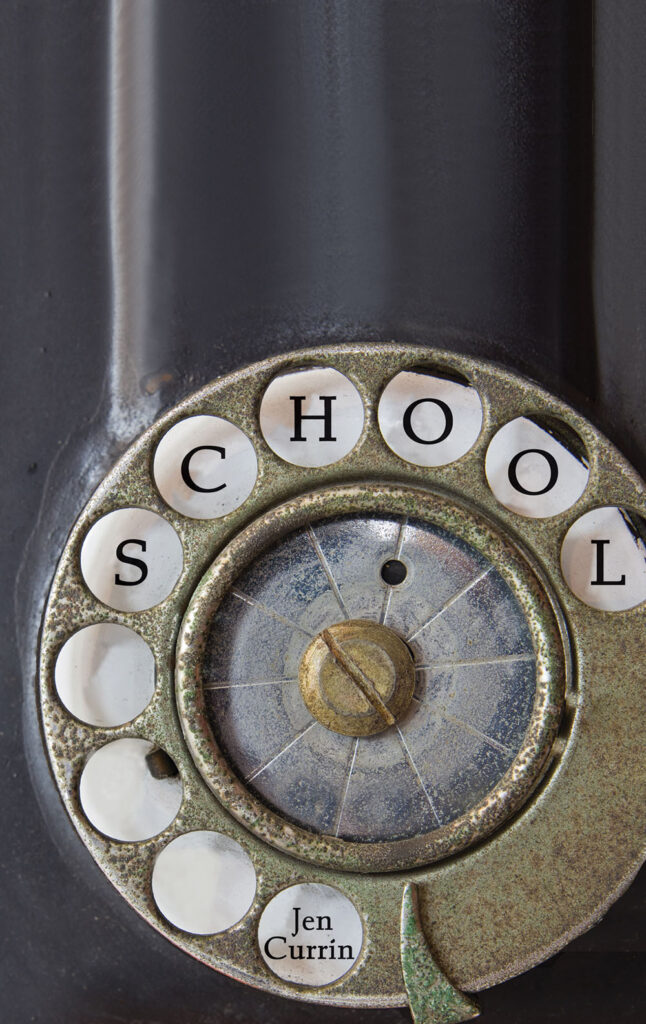 Rotary phone with the letters SCHOOL instead of numbers